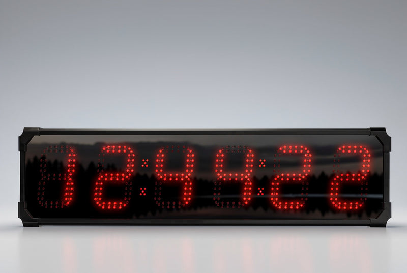 BigTimeClocks digital waterproof clock with red LED display on a gray background